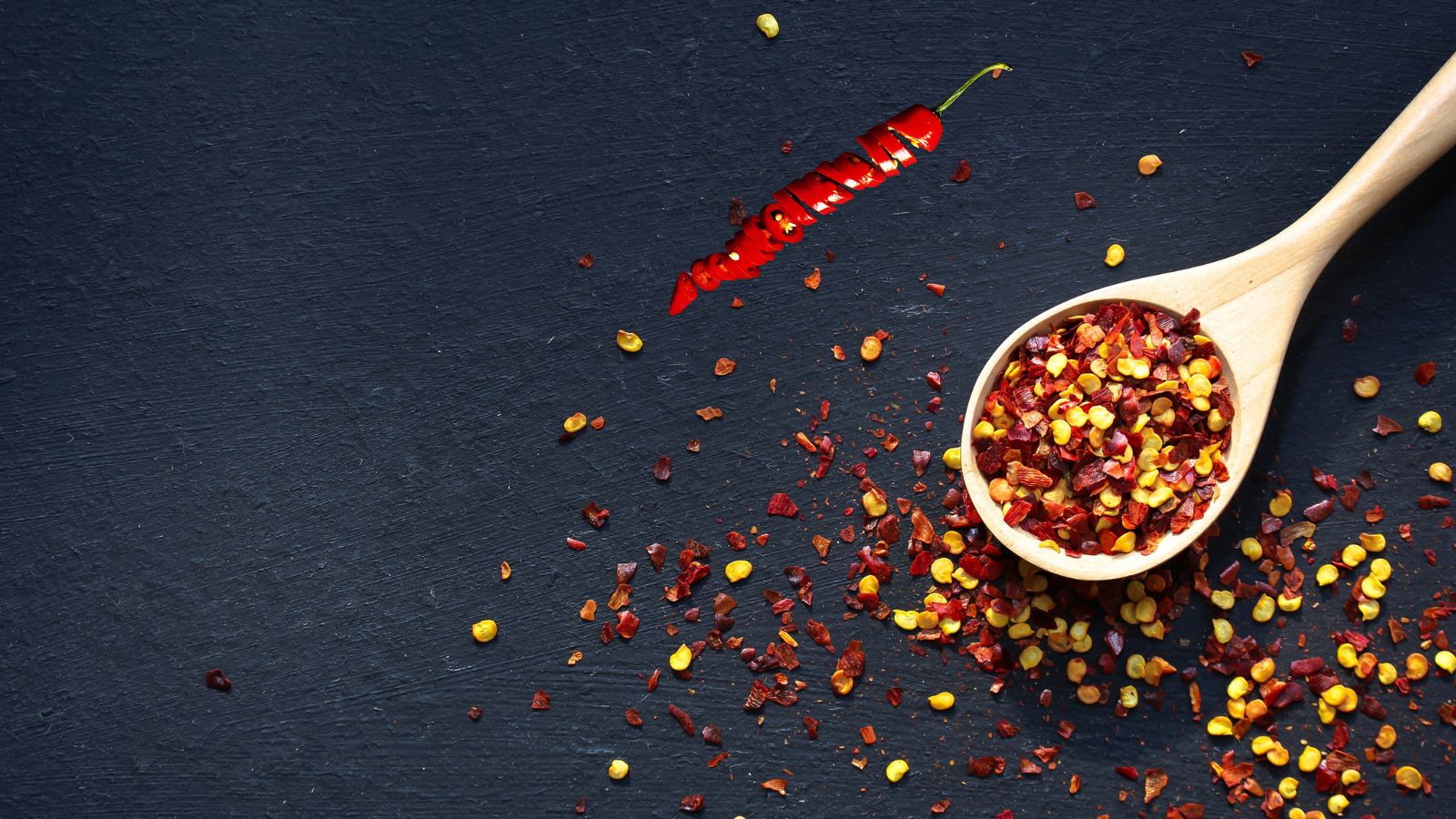 spice rack image of chilli flakes on a spoon